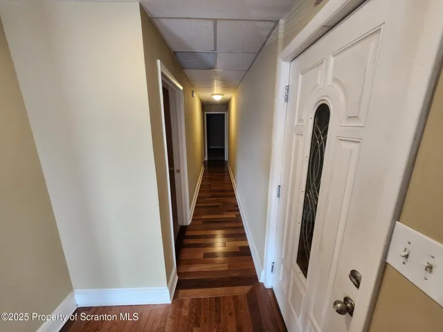 a view of hallway with stairs