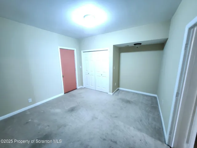 an empty room with an entryway