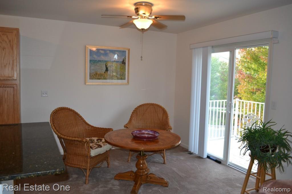 1740 Deepwood Circle, Unit 79 Rochester, MI 48307 - Photo 10 of 24 Cozy Sitting Area with Balcony View