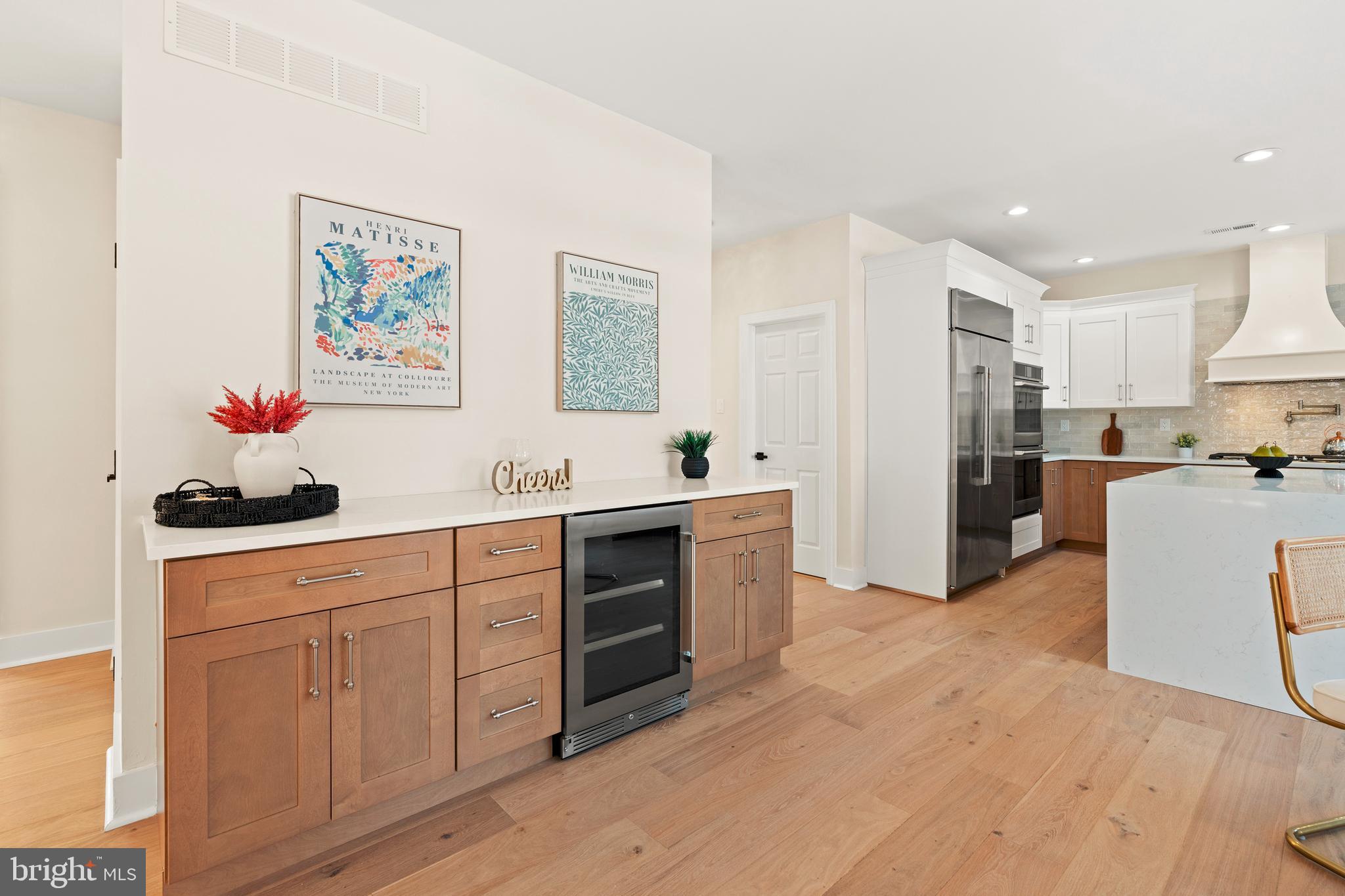 1586 Brookfield Road Newtown, PA 18940 - Photo 13 of 64 a kitchen with white cabinets and stainless steel appliances