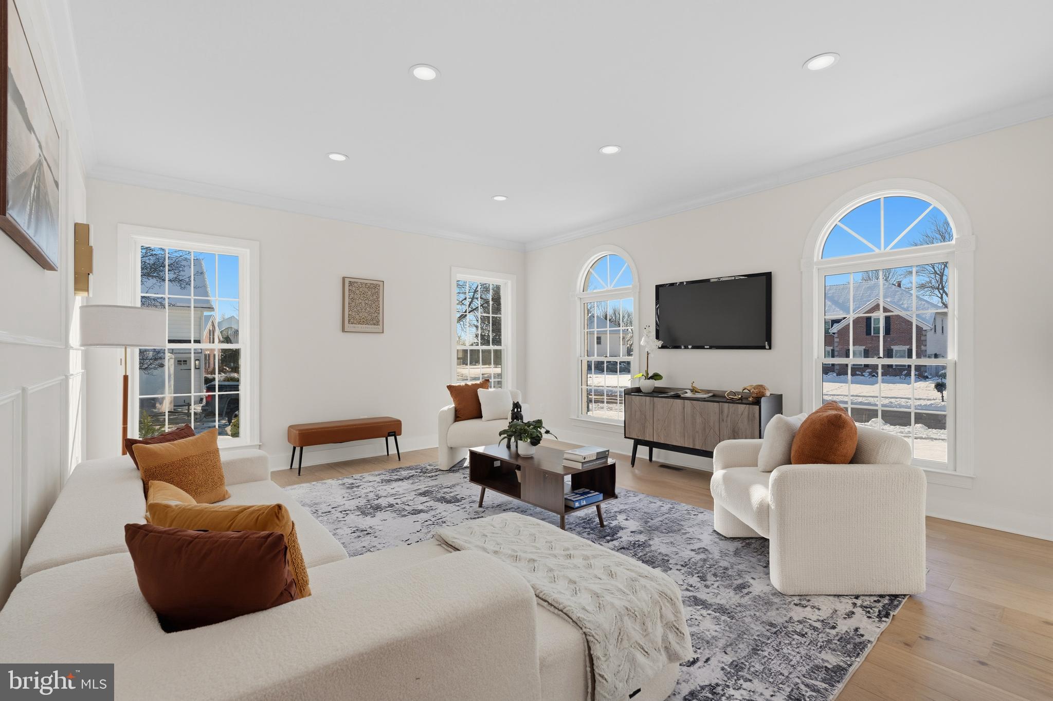 1586 Brookfield Road Newtown, PA 18940 - Photo 25 of 64 a bedroom with furniture a flat screen tv and a couch