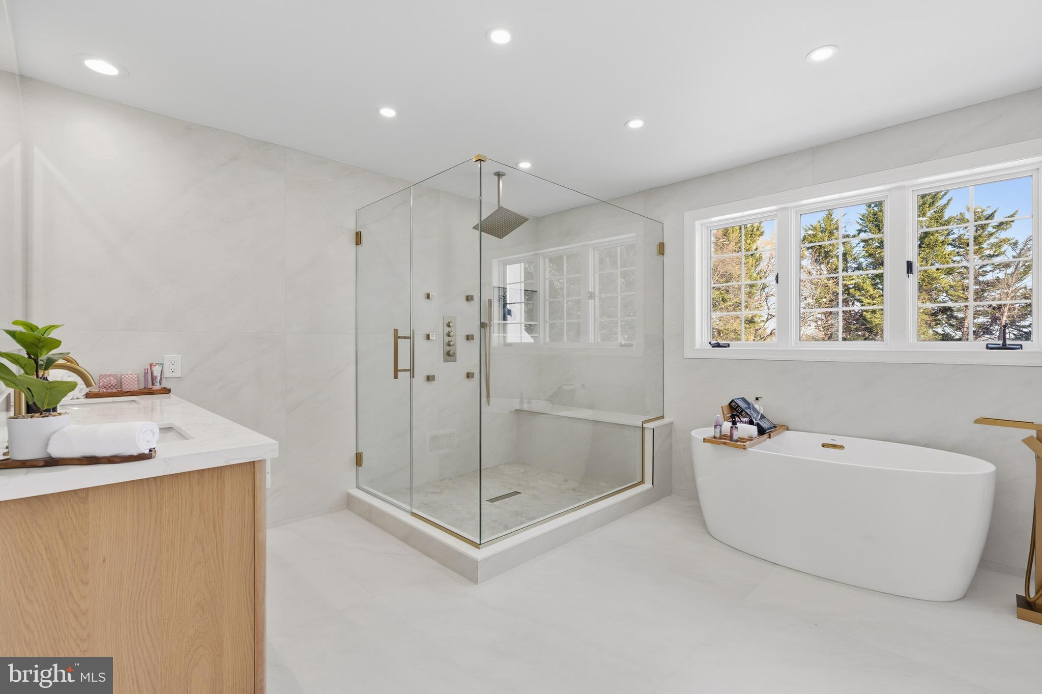 1586 Brookfield Road Newtown, PA 18940 - Photo 35 of 64 a bathroom with a tub sink and shower