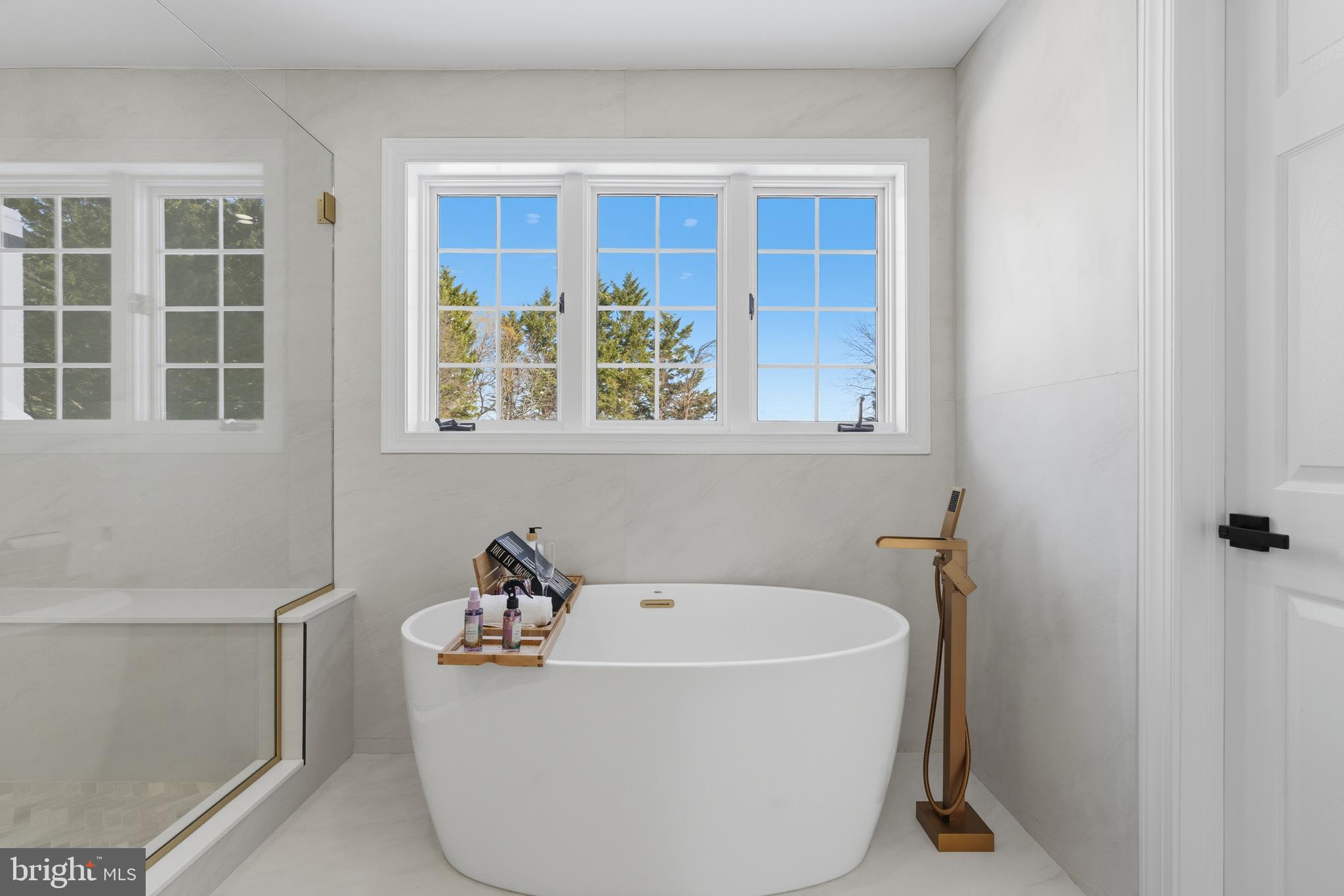 1586 Brookfield Road Newtown, PA 18940 - Photo 38 of 64 a white bath tub sitting next to a window