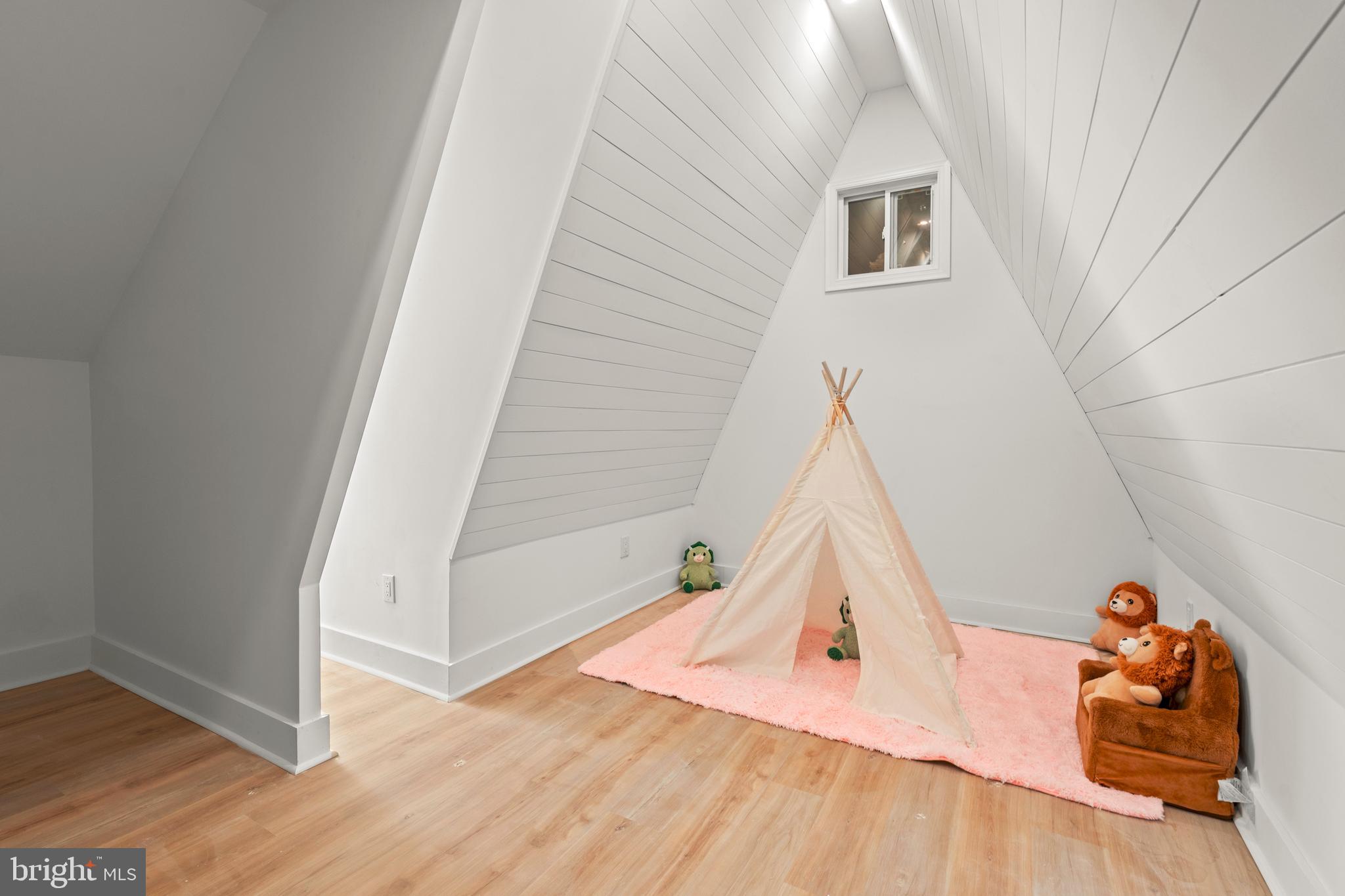 1586 Brookfield Road Newtown, PA 18940 - Photo 47 of 64 a view of a living room with wooden floor and stairs