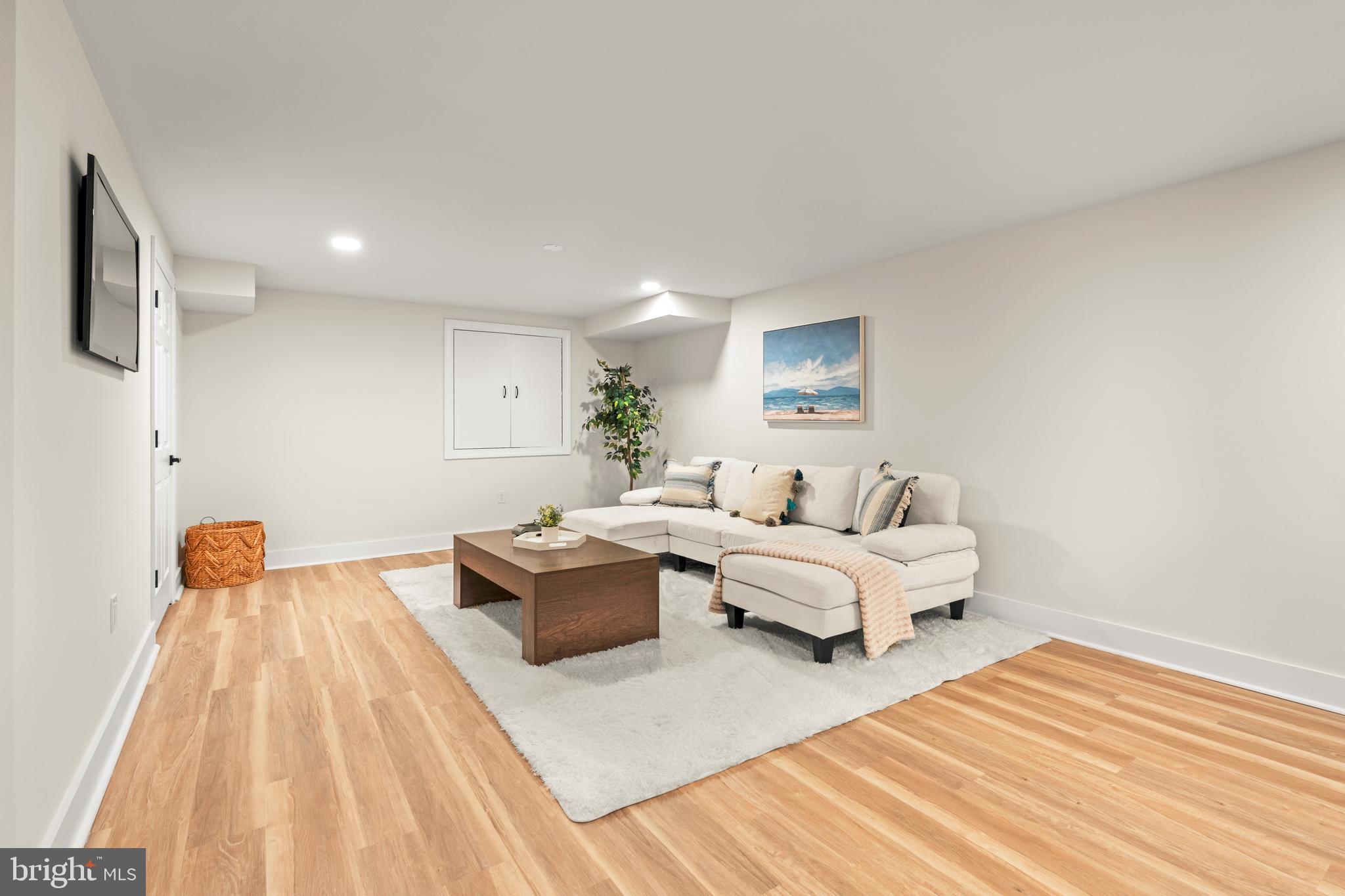 1586 Brookfield Road Newtown, PA 18940 - Photo 53 of 64 a living room with furniture and a wooden floor