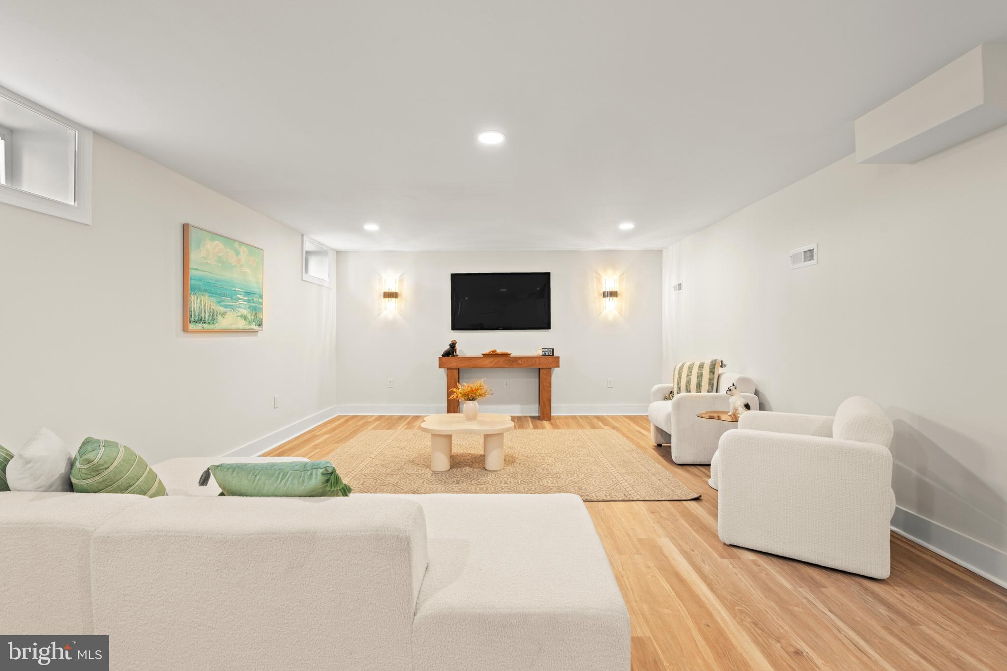 1586 Brookfield Road Newtown, PA 18940 - Photo 57 of 64 a living room with furniture and a flat screen tv