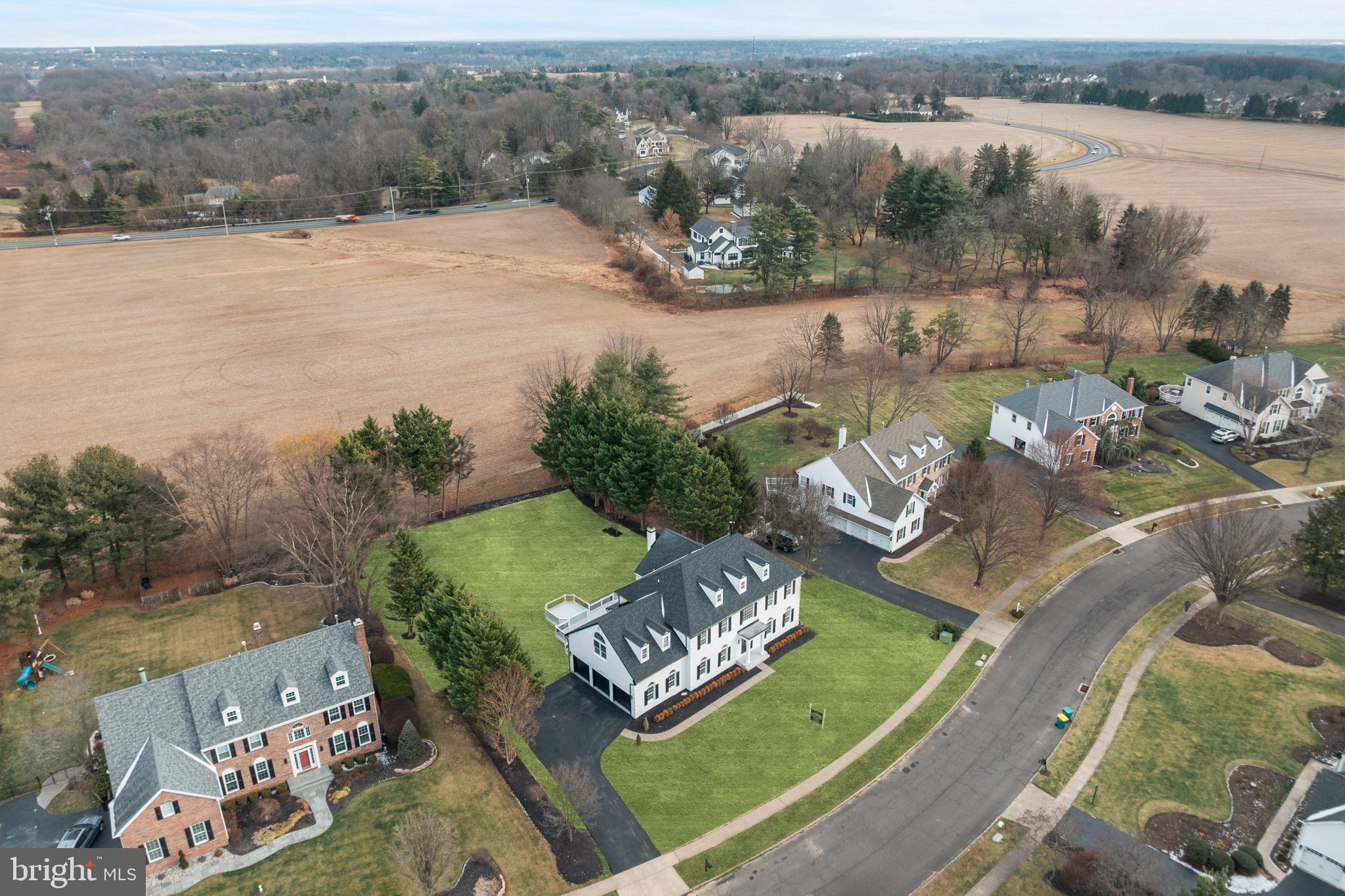 1586 Brookfield Road Newtown, PA 18940 - Photo 62 of 64 an aerial view of a house with outdoor space and lake view