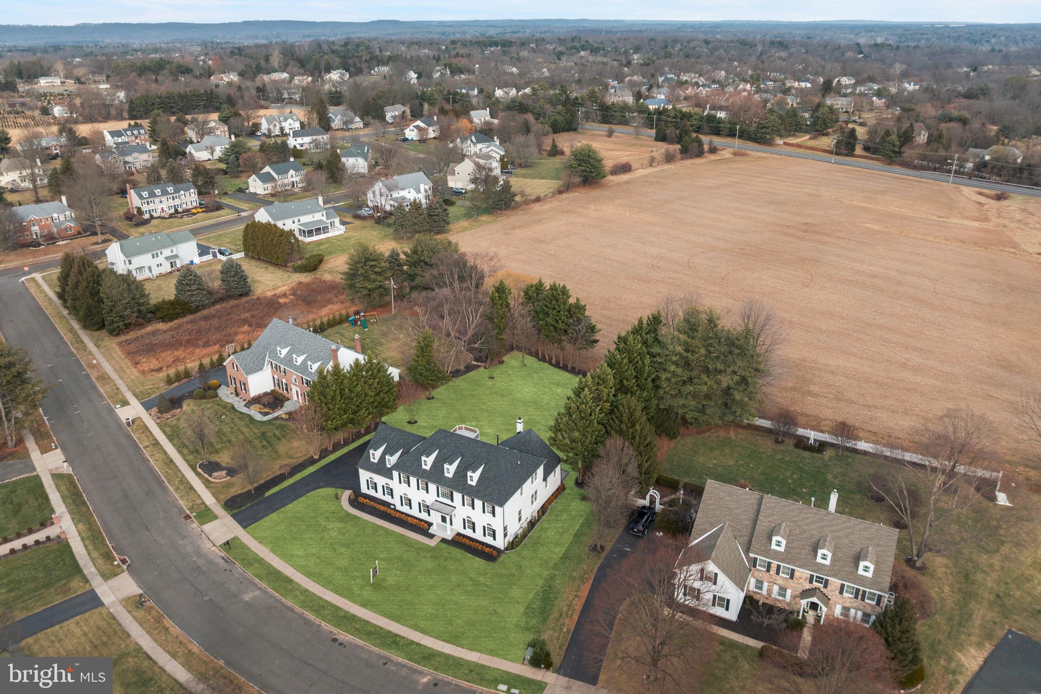 1586 Brookfield Road Newtown, PA 18940 - Photo 63 of 64 an aerial view of a house with a yard