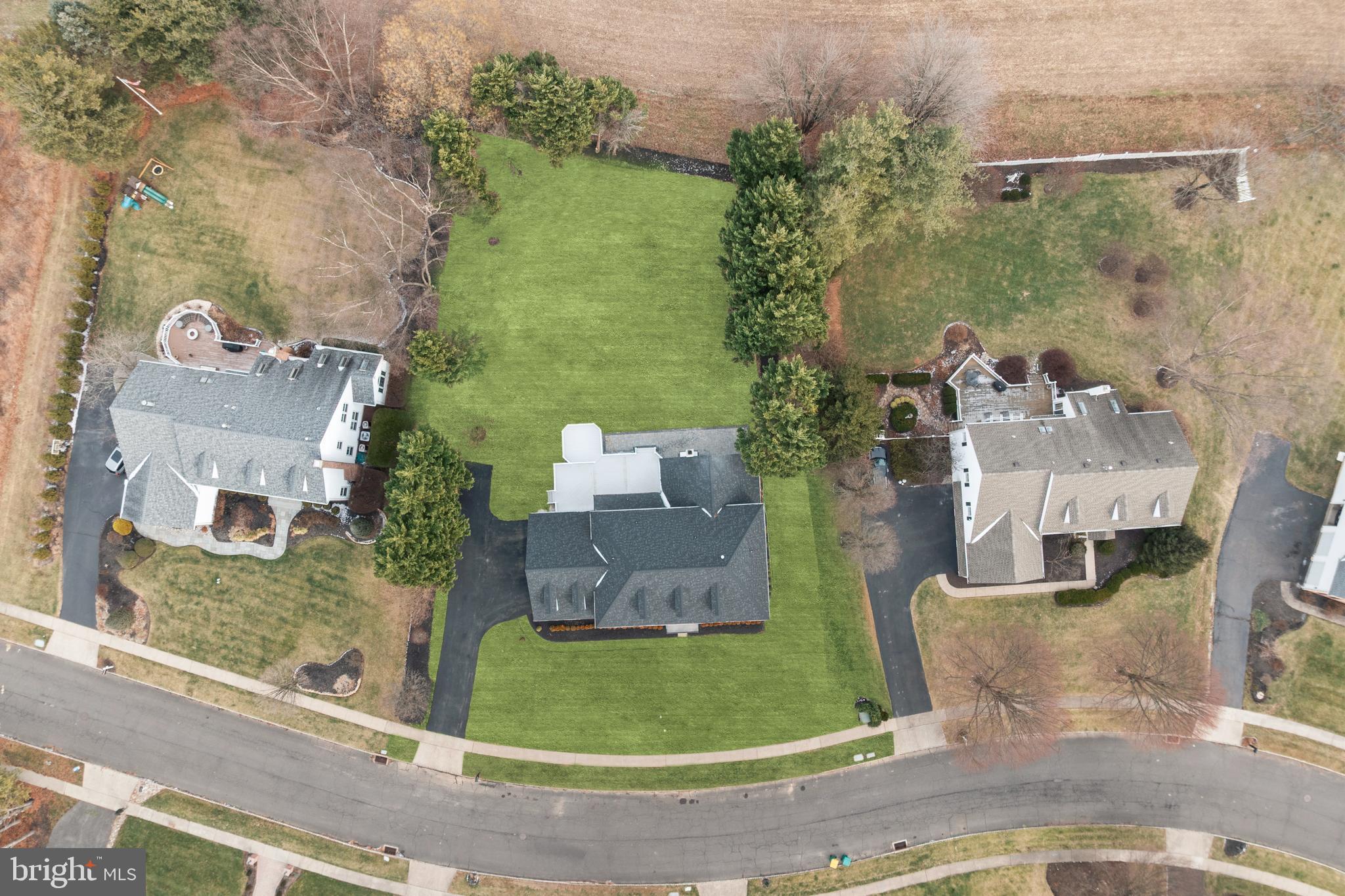 1586 Brookfield Road Newtown, PA 18940 - Photo 64 of 64 an aerial view of a house with a yard