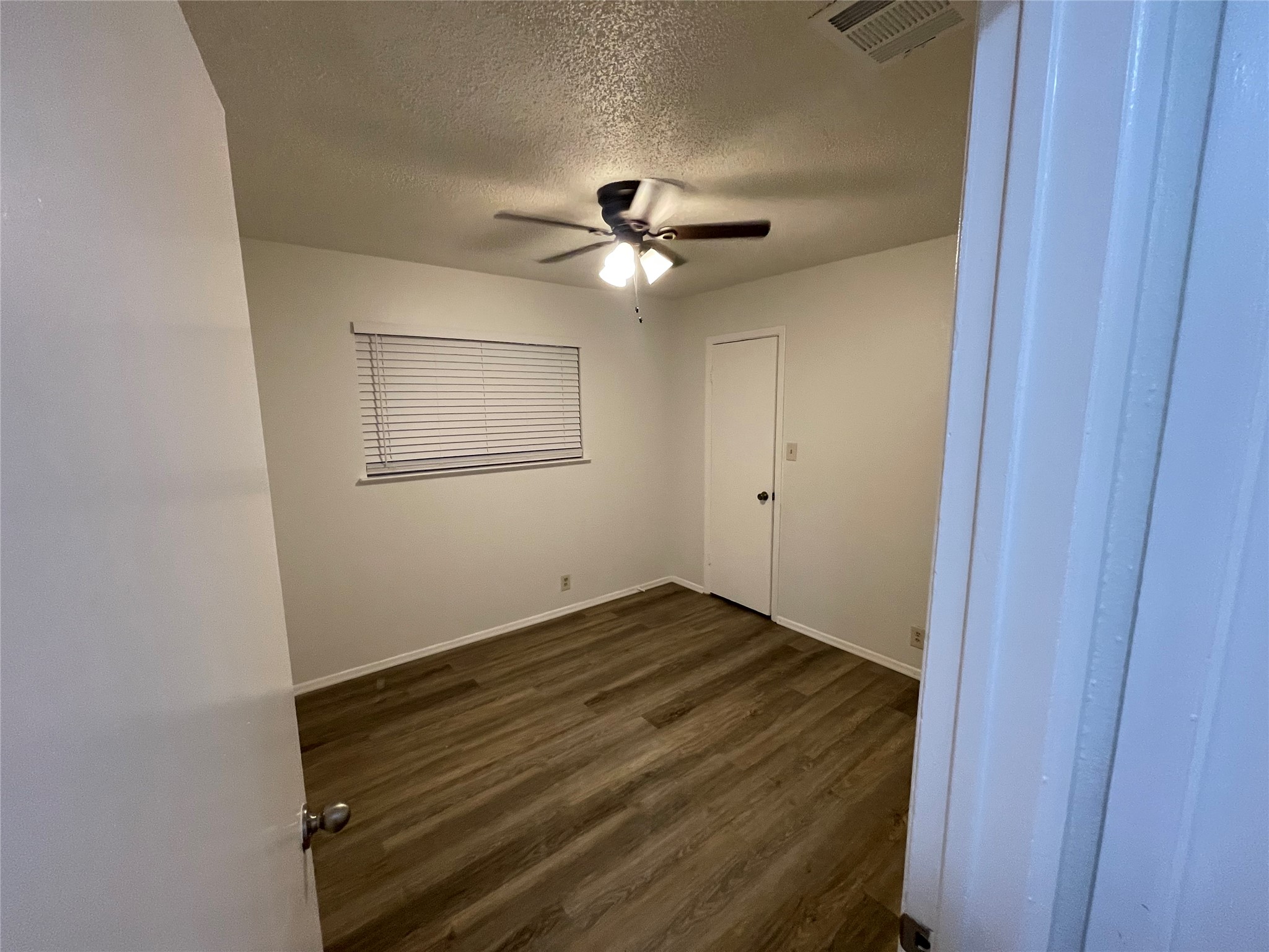 6206 Linda Lane, Unit A Austin, TX 78723 - Photo 14 of 19 wooden floor in an empty room