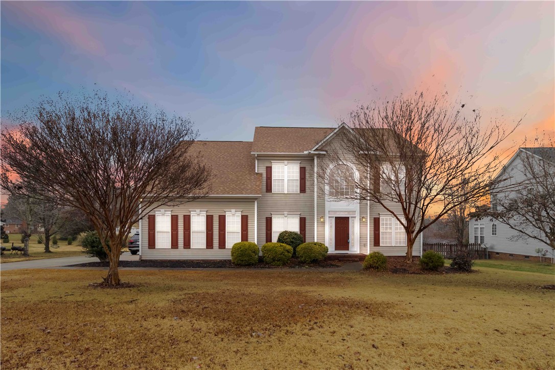 215 Ridge Bay Court Greenville, SC 29611 - Photo 1 of 35 This two-story residence offers a welcoming facade with a classic exterior and well-maintained grounds.