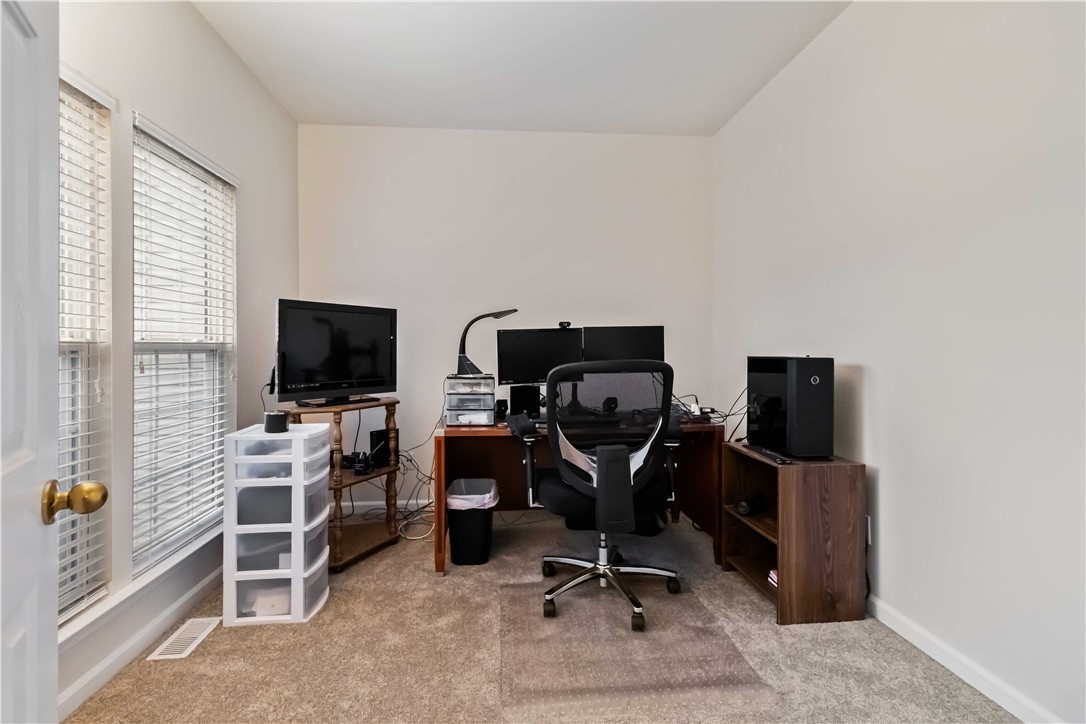 215 Ridge Bay Court Greenville, SC 29611 - Photo 17 of 35 This versatile office space offers a productive environment for work or study.
