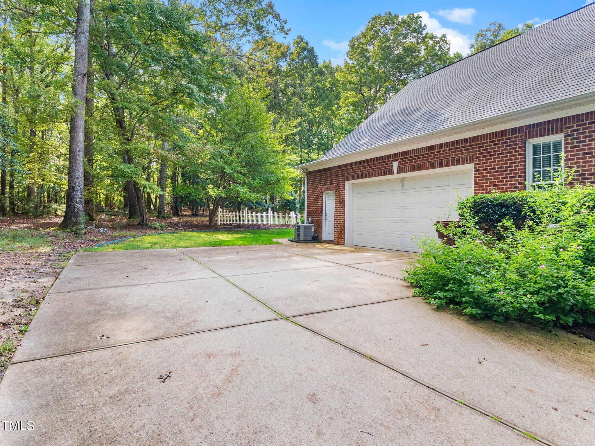10937 Cahill Road Raleigh, NC 27614 - Photo 46 of 53 Side Load Garage + Extra Parking Space for Guest Parking