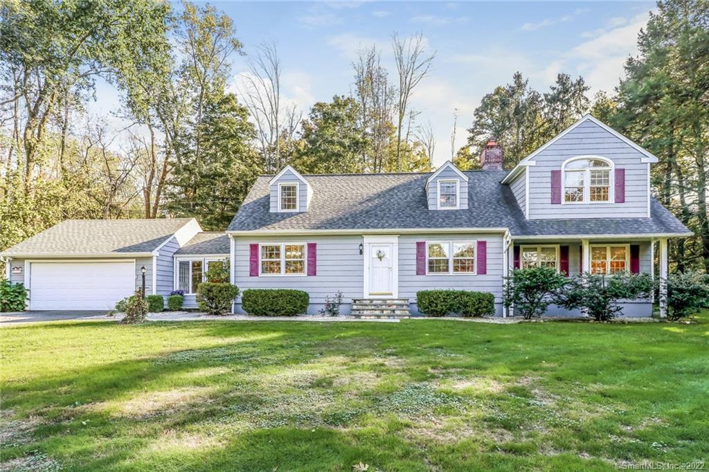 19 Pond Road Ridgefield, CT 06877 - Photo 1 of 1 a front view of a house with a yard