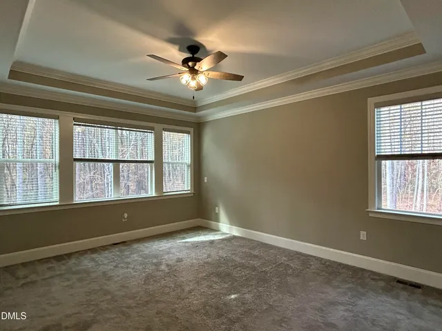 a view of a balcony with wooden floor