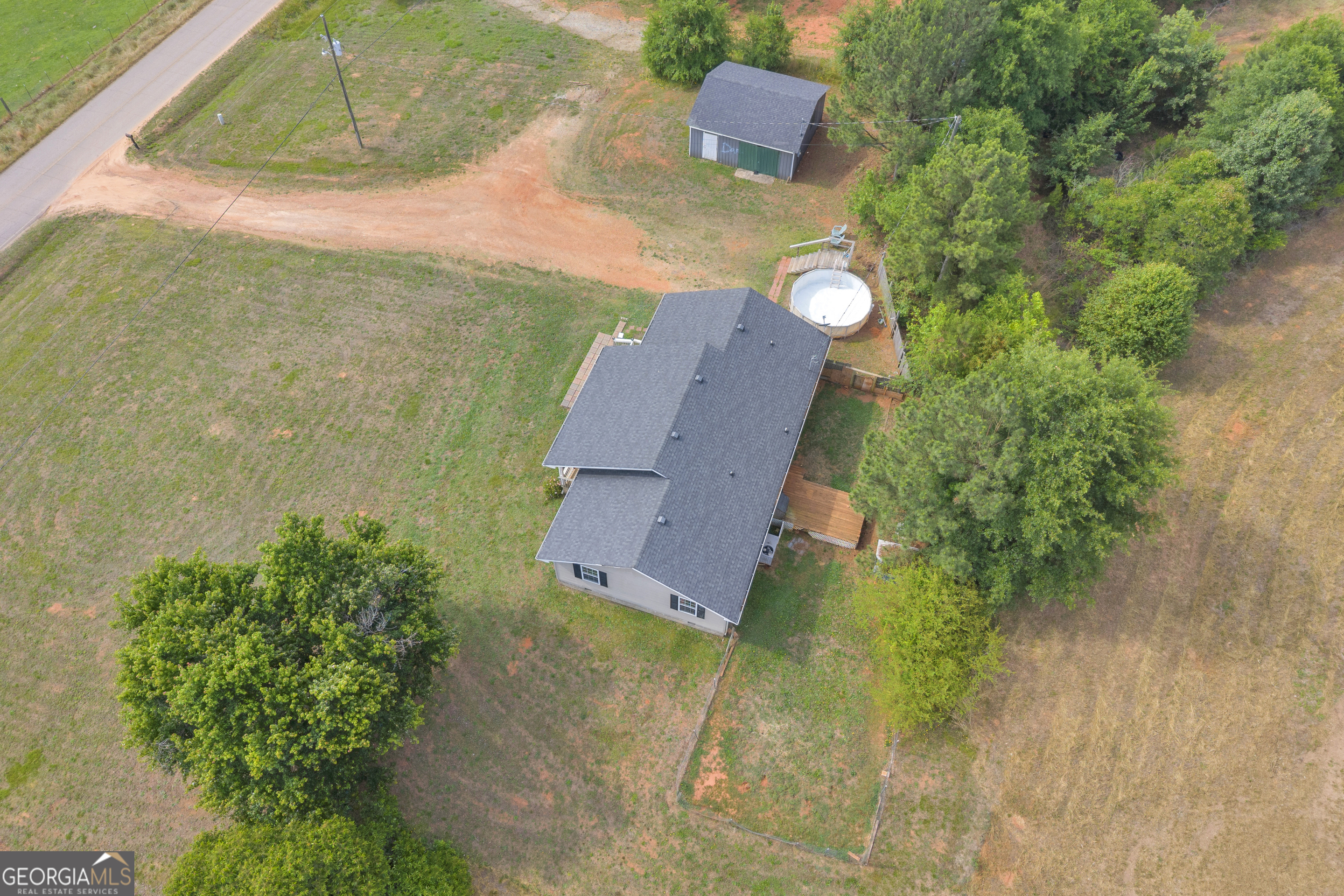 156 Shirley Road Royston, GA 30662 - Photo 2 of 29 an aerial view of a house with a yard
