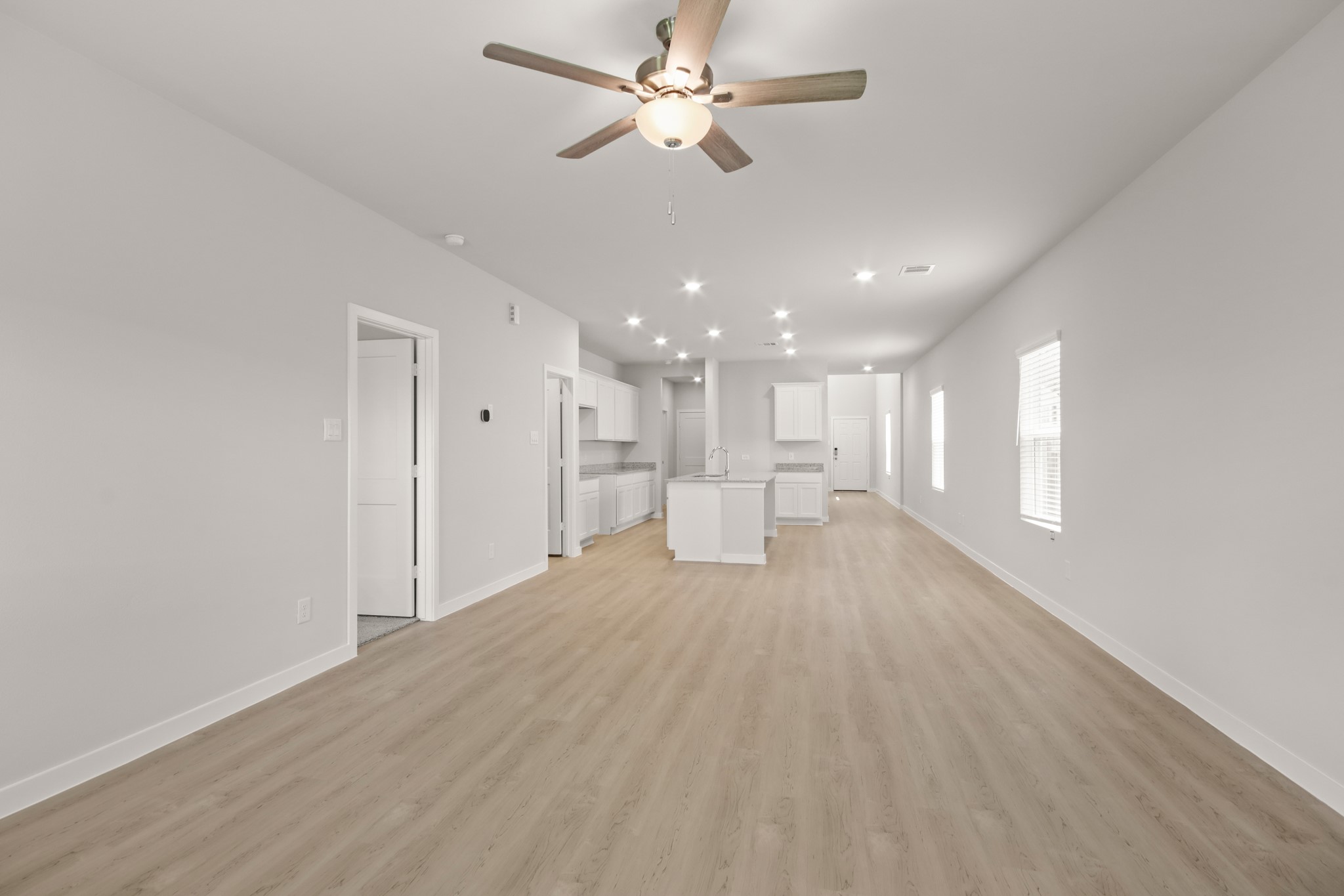 253 Spring Drive Hockley, TX 77447 - Photo 5 of 22 a view of an empty room with a window
