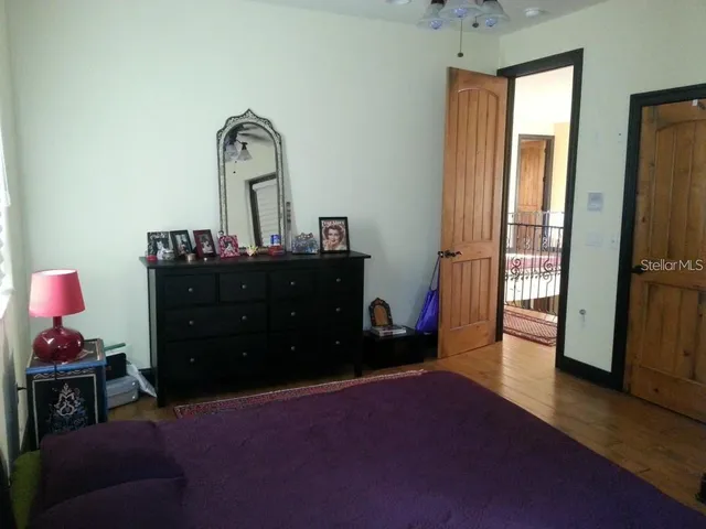 a view of balcony with wooden floor