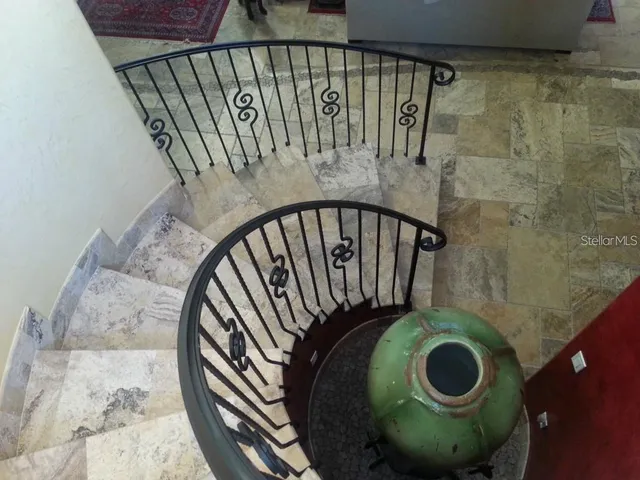 a view of livingroom with furniture and workspace