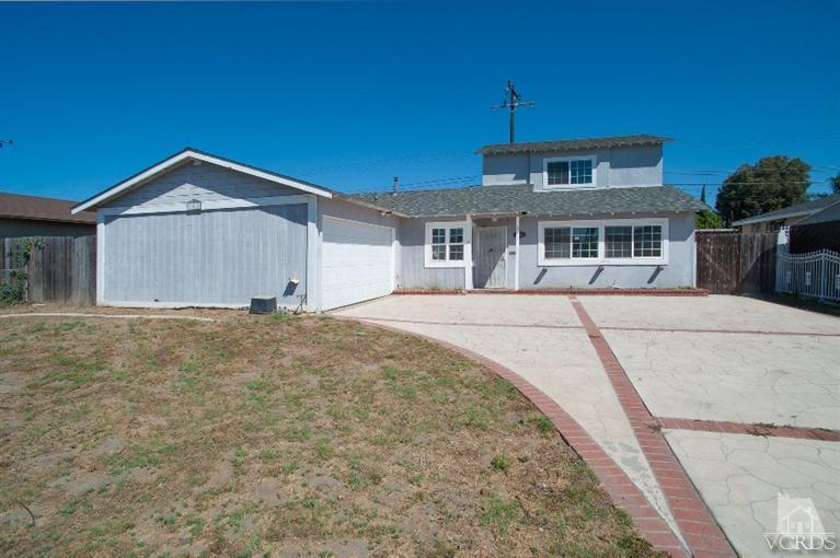 311 West Bard Road Oxnard, CA 93033 - Photo 1 of 10 a front view of a house with a yard