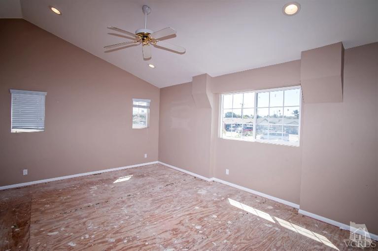 311 West Bard Road Oxnard, CA 93033 - Photo 3 of 10 a view of an empty room with a window