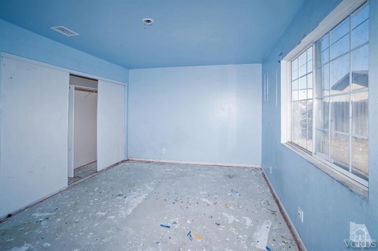 311 West Bard Road Oxnard, CA 93033 - Photo 9 of 10 a view of an empty room with a window
