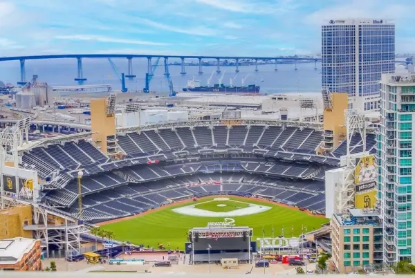 a view of a kitchen with stainless steel appliances and stove top oven