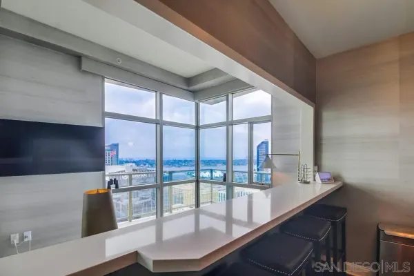 a kitchen with a sink cabinets and appliances