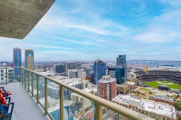 a view of a balcony with city view