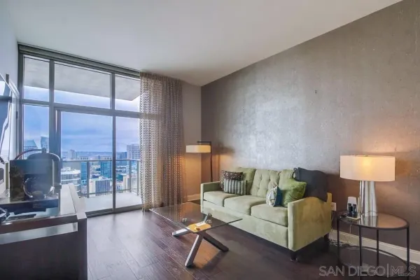 a view of a swimming pool with a yard