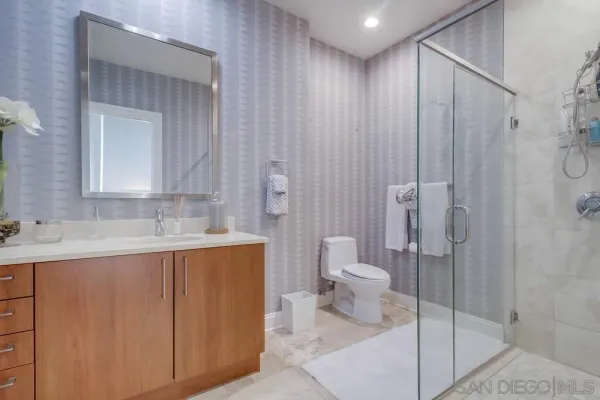 a building outdoor space with patio furniture and potted plants