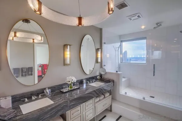 a view of a house with swimming pool and porch