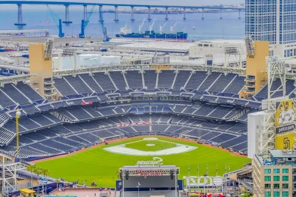 a view of a patio with table and chairs and potted plants