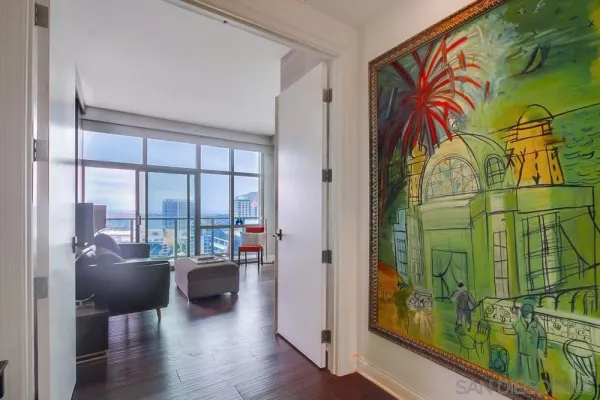 a living room with furniture and a large window