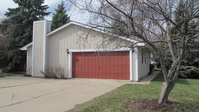 a house with trees in front of it