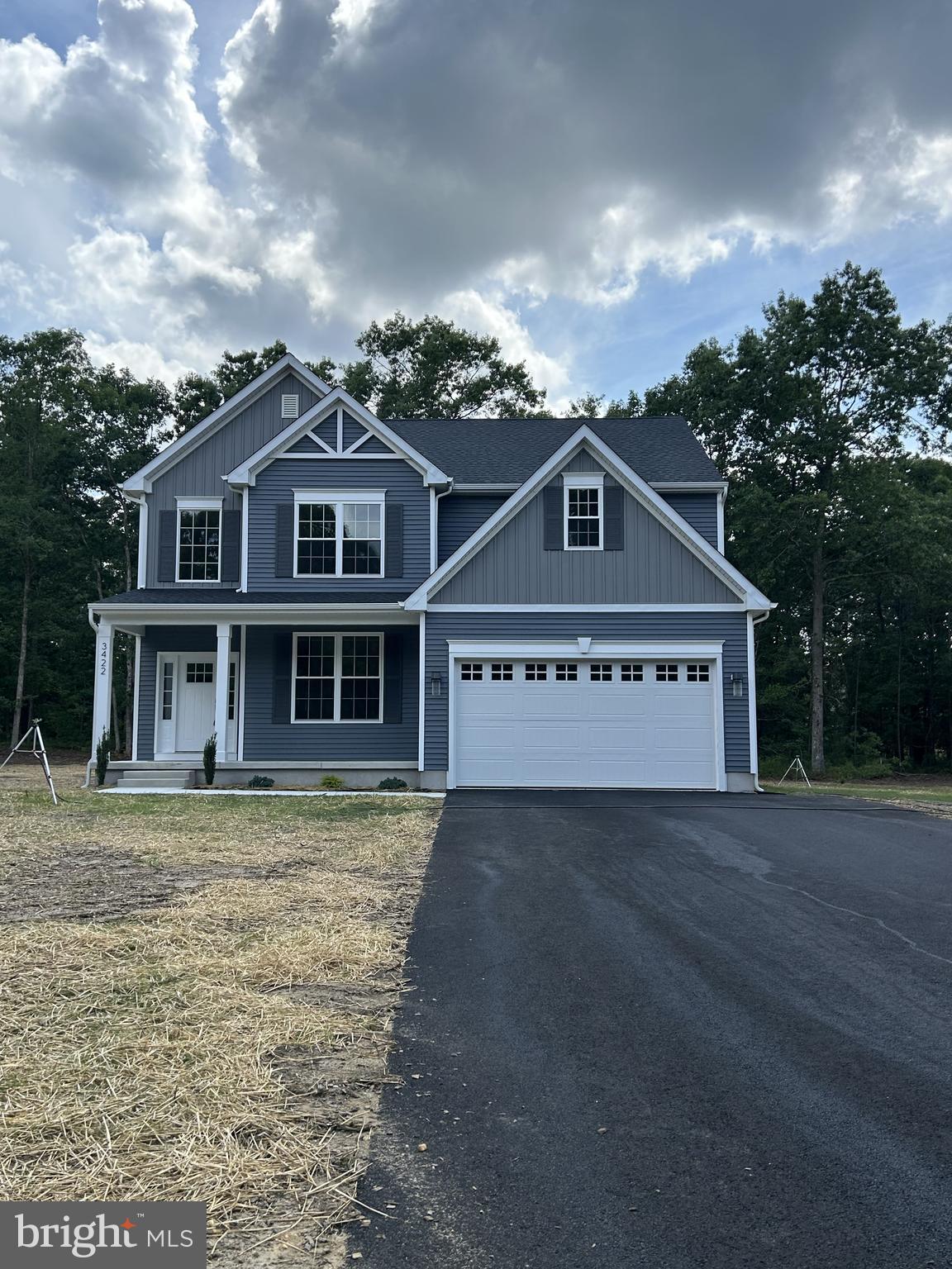 1178 South Spring Road Vineland, NJ 08361 - Photo 2 of 45 a front view of a house with a garden