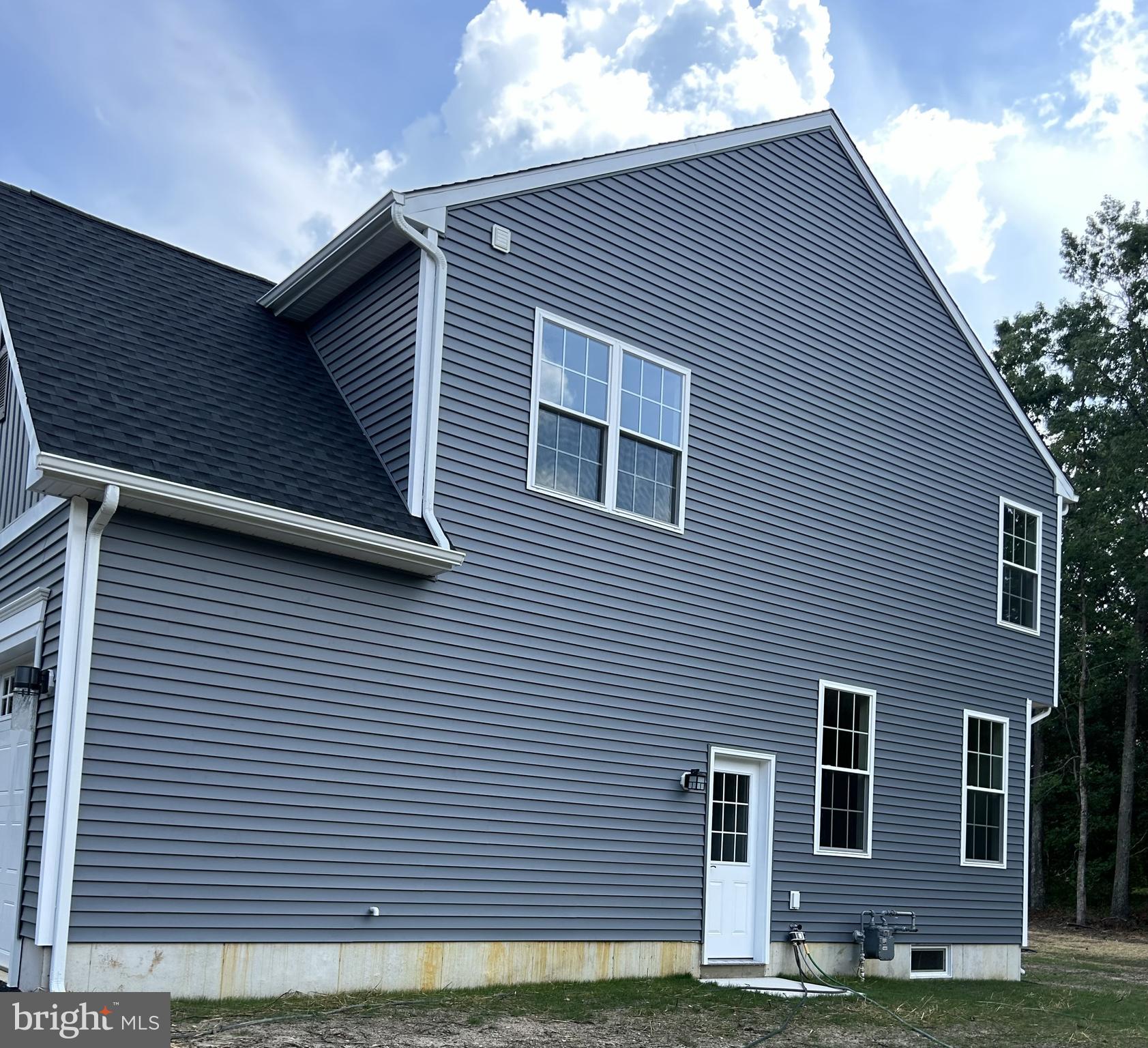 1178 South Spring Road Vineland, NJ 08361 - Photo 6 of 45 a front view of a house with a garage