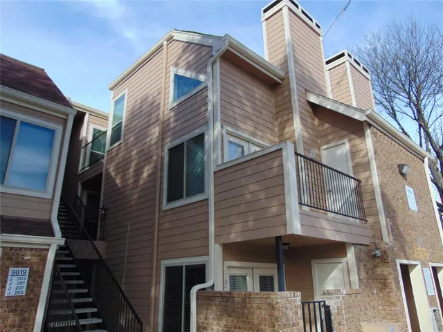 a view of a house with a large door
