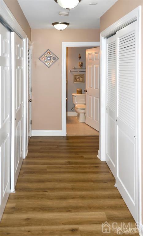 358 Rector Street, Unit 502 Perth Amboy, NJ 08861 - Photo 8 of 13 a view of a hallway with wooden floor and entryway