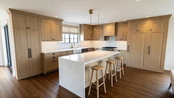 a kitchen with a table chairs refrigerator and microwave