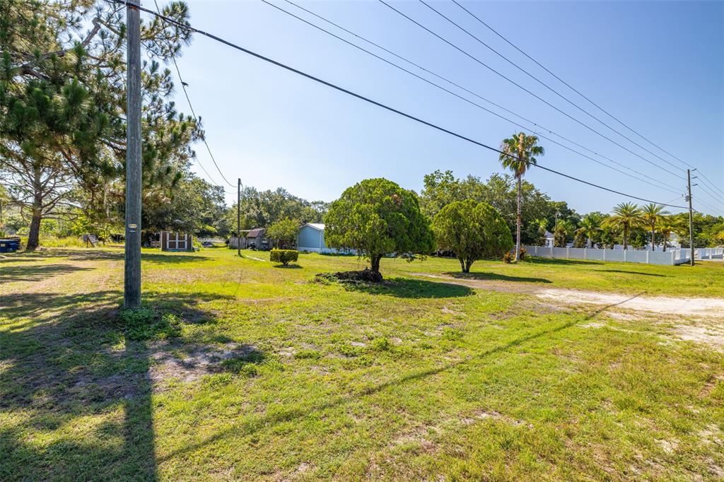 7308 Boyette Road Wesley Chapel, FL 33545 - Photo 7 of 36 a view of a swimming pool with an outdoor space