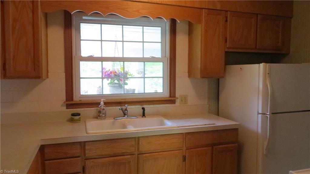 350 Doub Road Lewisville, NC 27023 - Photo 4 of 28 Updated cabinets and appliances remain.