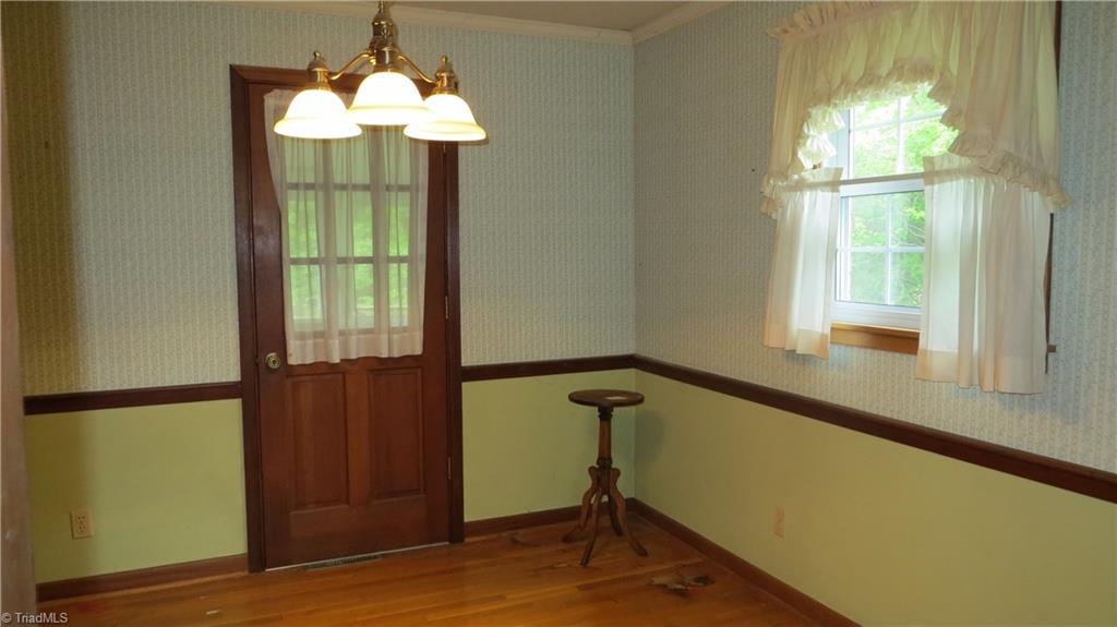350 Doub Road Lewisville, NC 27023 - Photo 6 of 28 The dining room leads out to the screened porch.