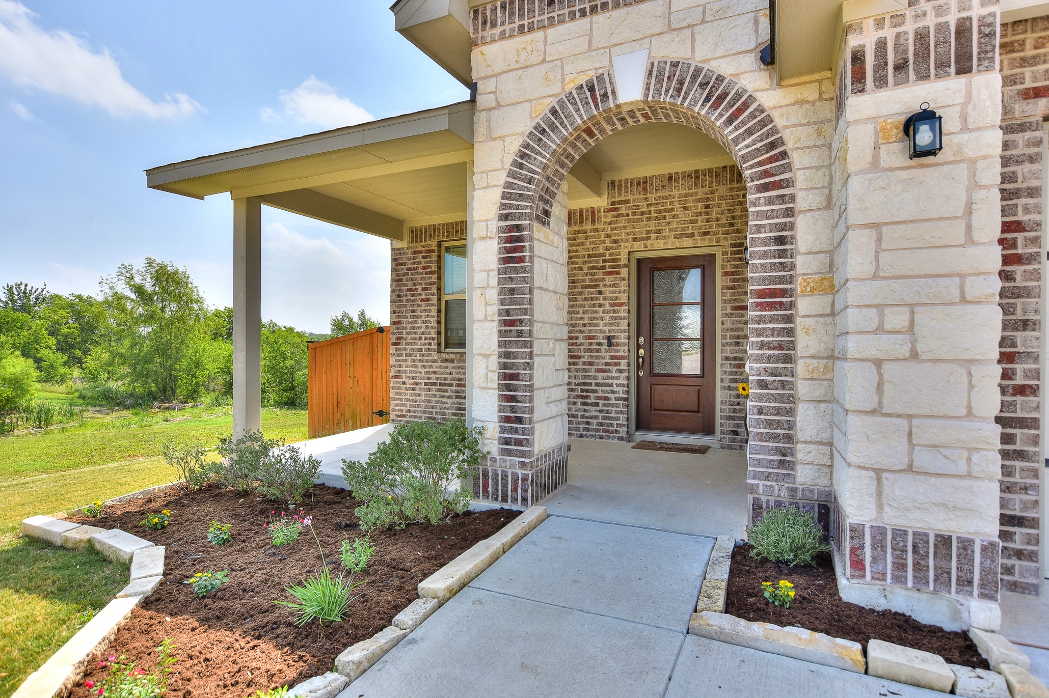 408 Nautical Loop Kyle, TX 78640 - Photo 1 of 1 MOVE IN READY! GREAT LOCATION! Awesome front entrance with nice landscaping, detailed columns and covered front porch