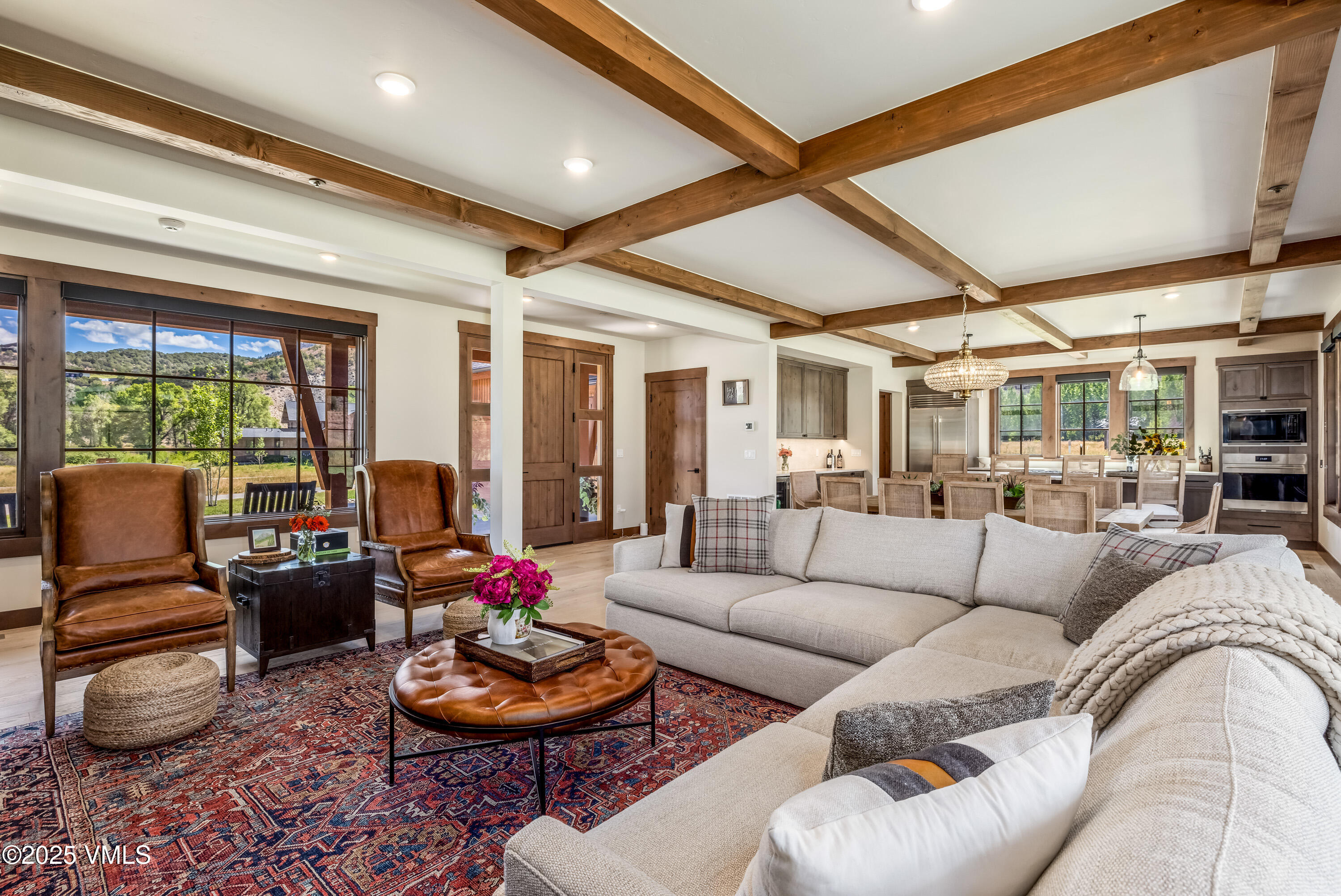 664 Hunters View Lane Eagle, CO 81631 - Photo 12 of 35 a living room with furniture and a large window