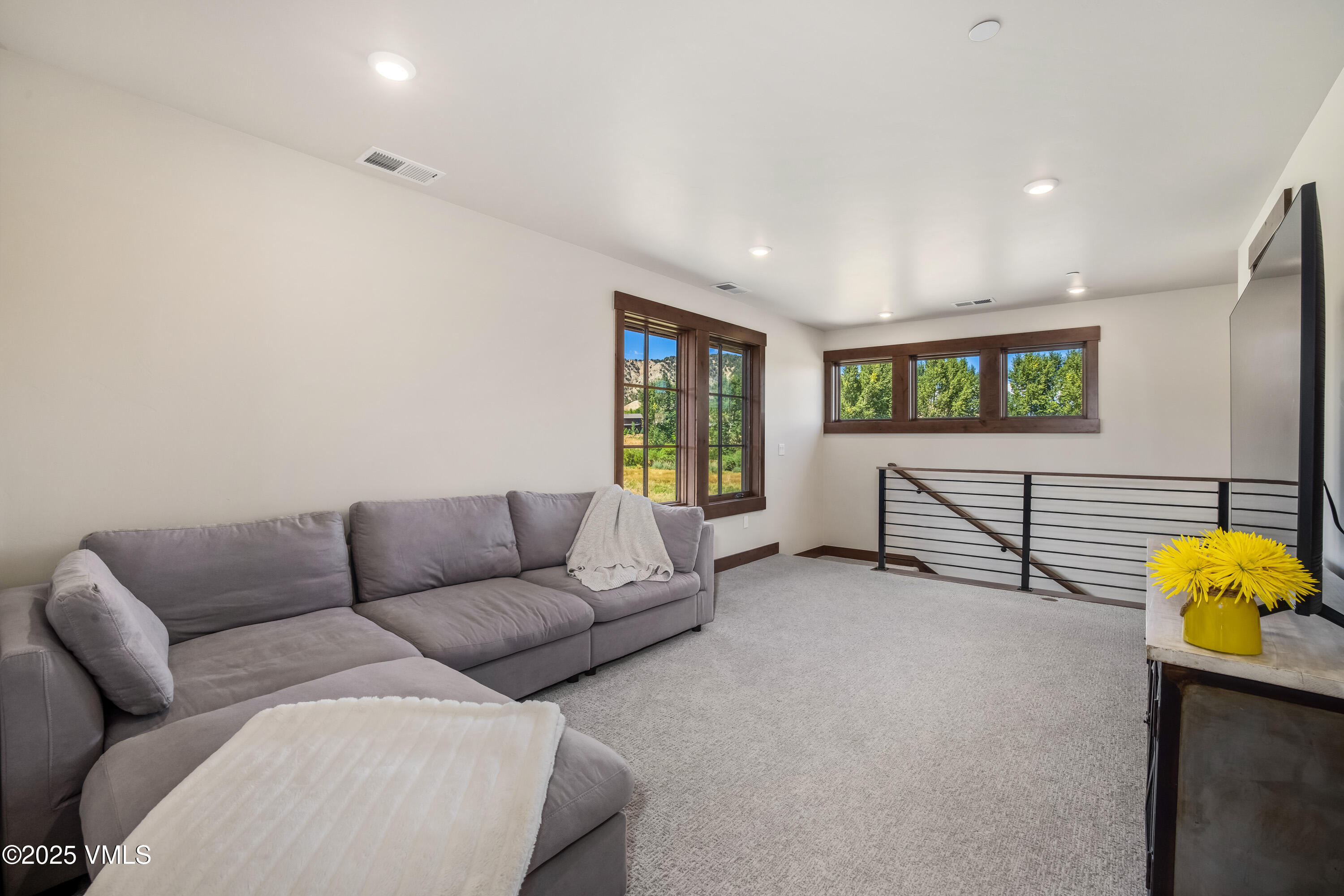 664 Hunters View Lane Eagle, CO 81631 - Photo 20 of 35 a living room with furniture and a window