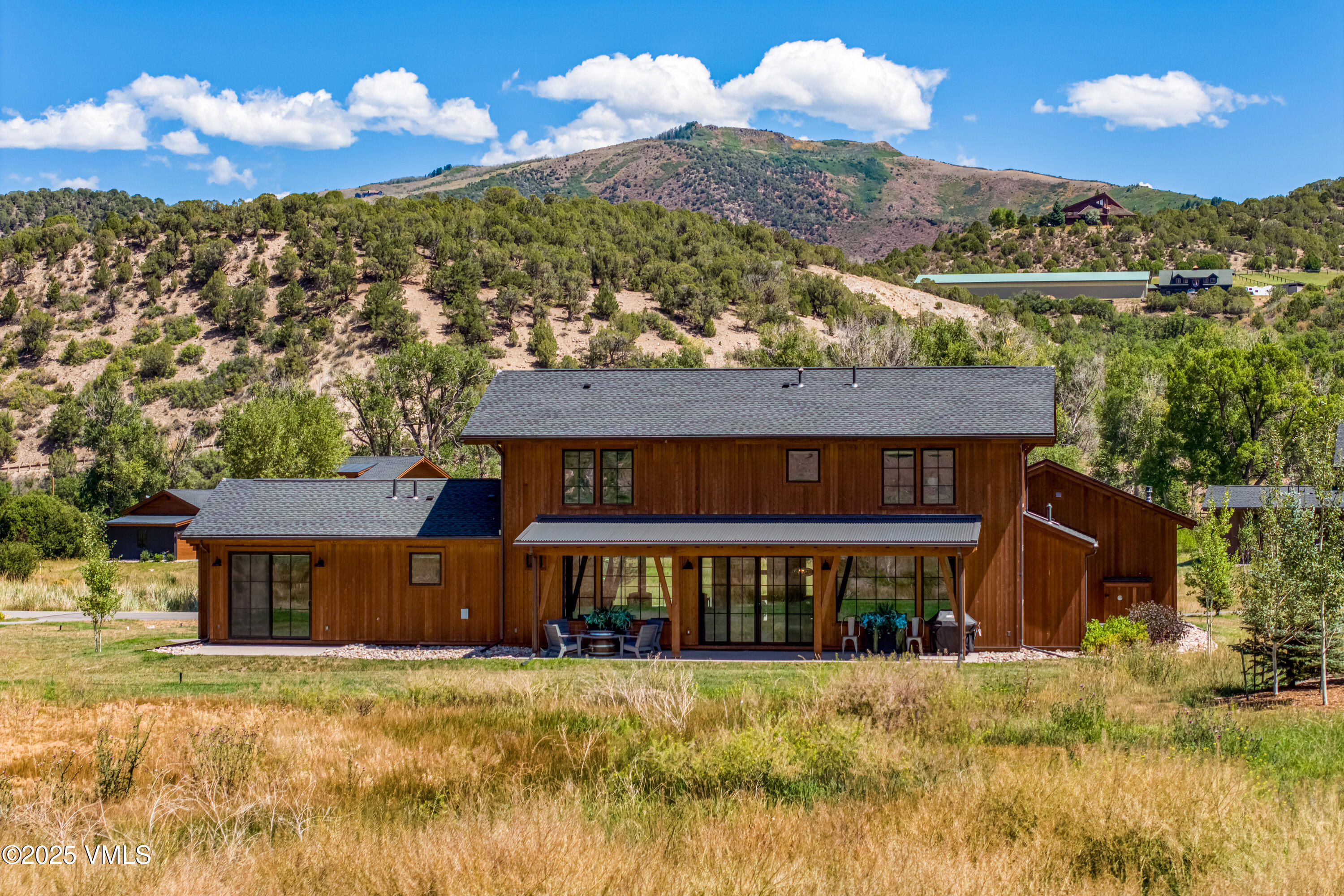 664 Hunters View Lane Eagle, CO 81631 - Photo 34 of 35 a view of a house with a yard and large tree