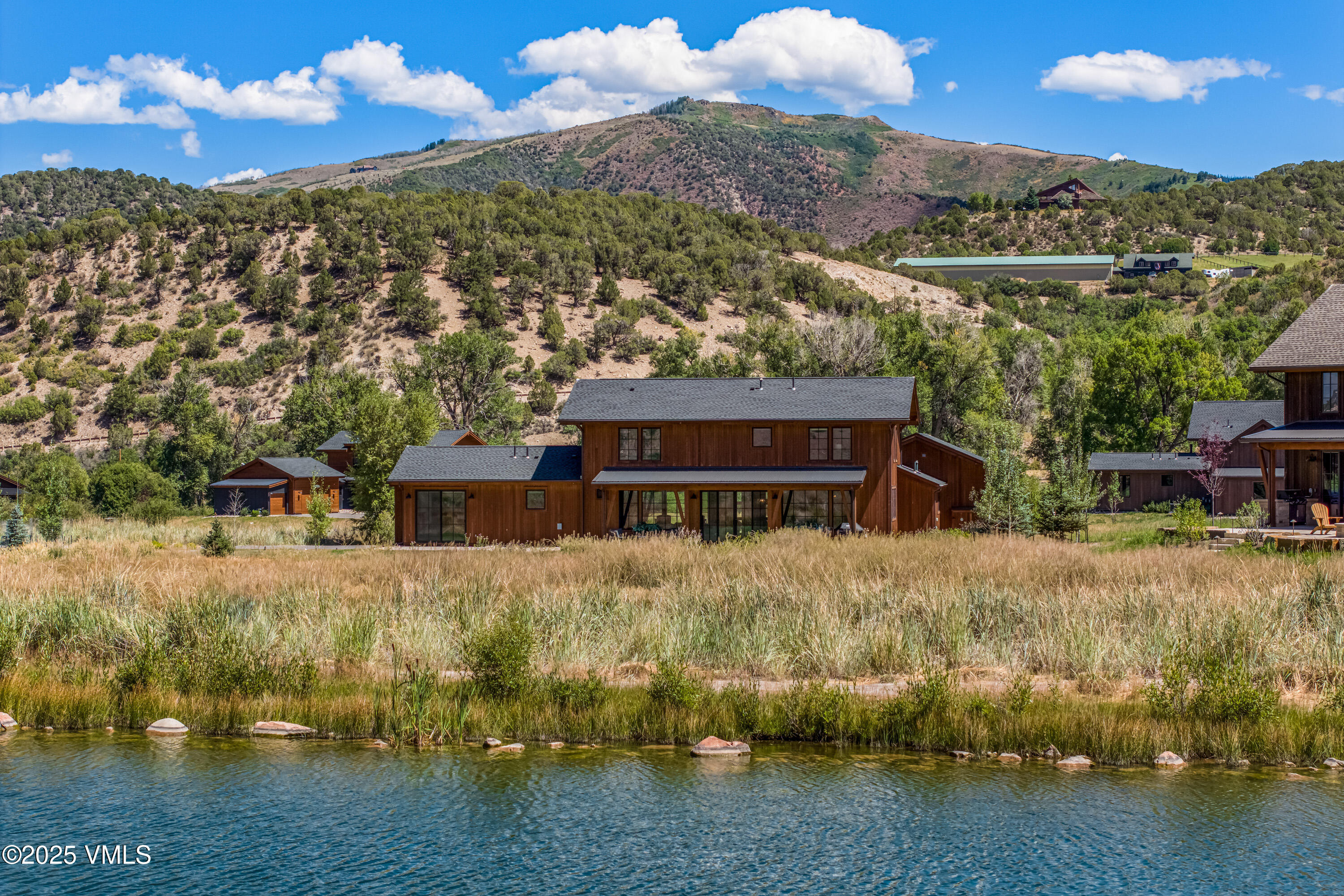 664 Hunters View Lane Eagle, CO 81631 - Photo 35 of 35 a view of a house with a yard