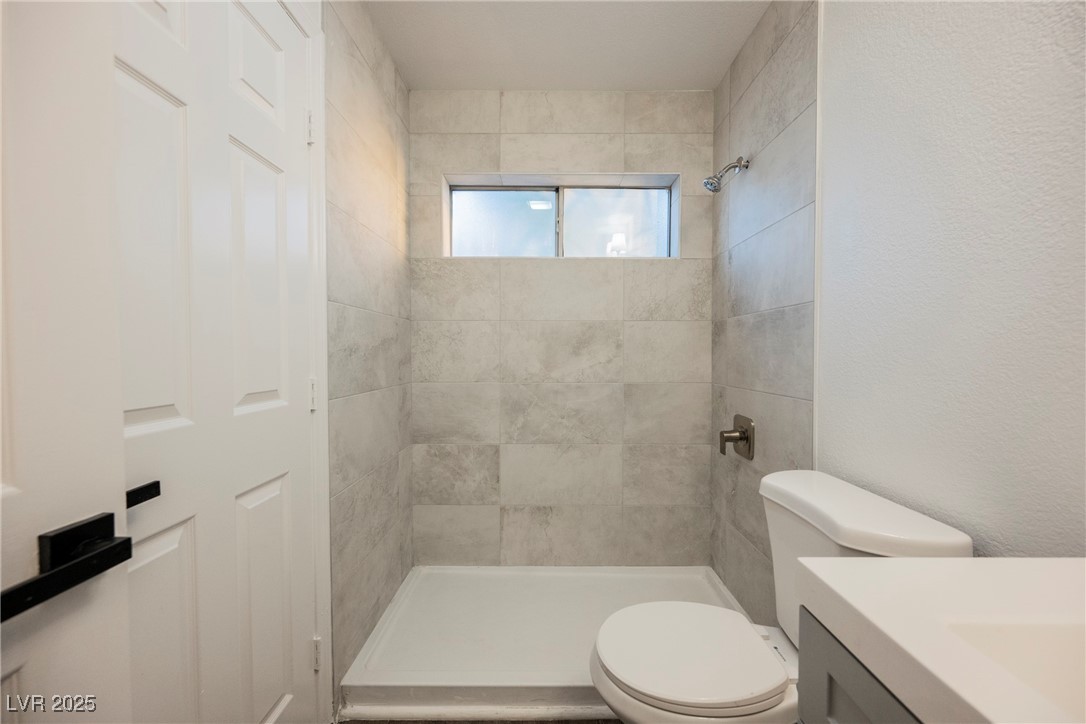 1706 Toltec Circle Henderson, NV 89014 - Photo 15 of 21 Bathroom with vanity and a stall shower