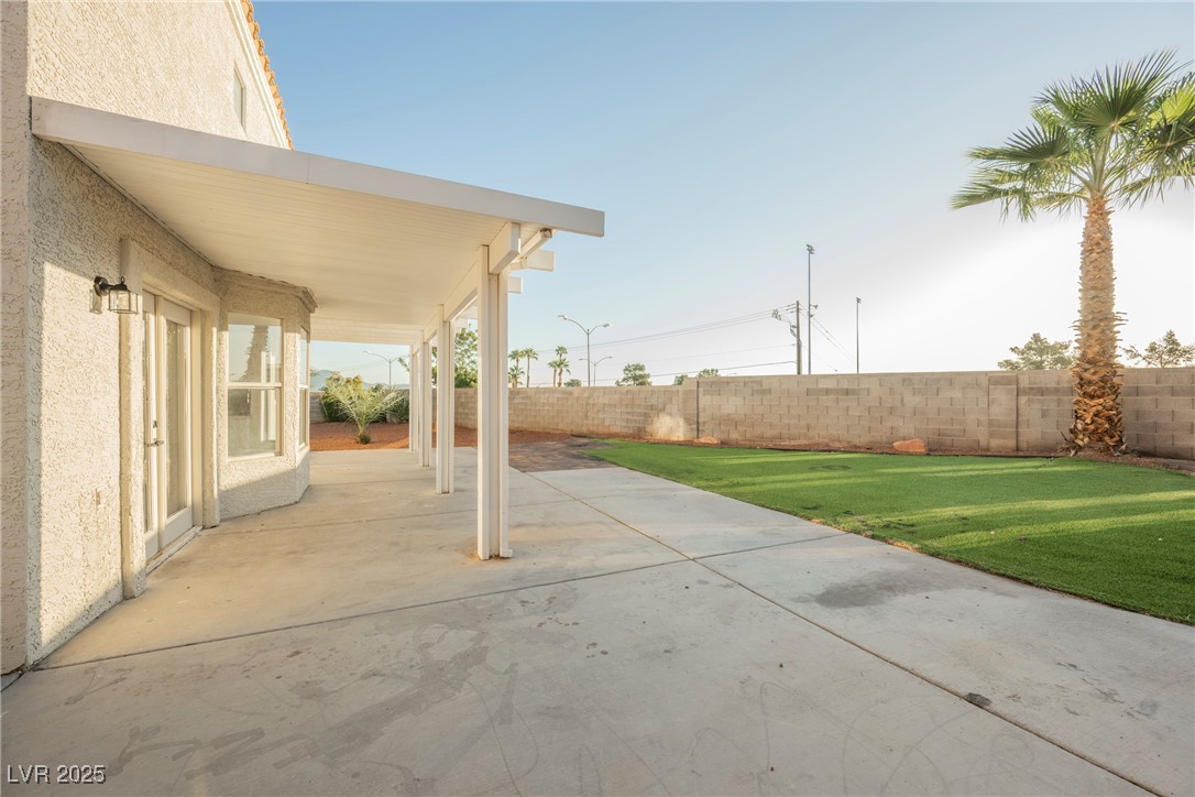 1706 Toltec Circle Henderson, NV 89014 - Photo 19 of 21 Fenced backyard featuring a patio area